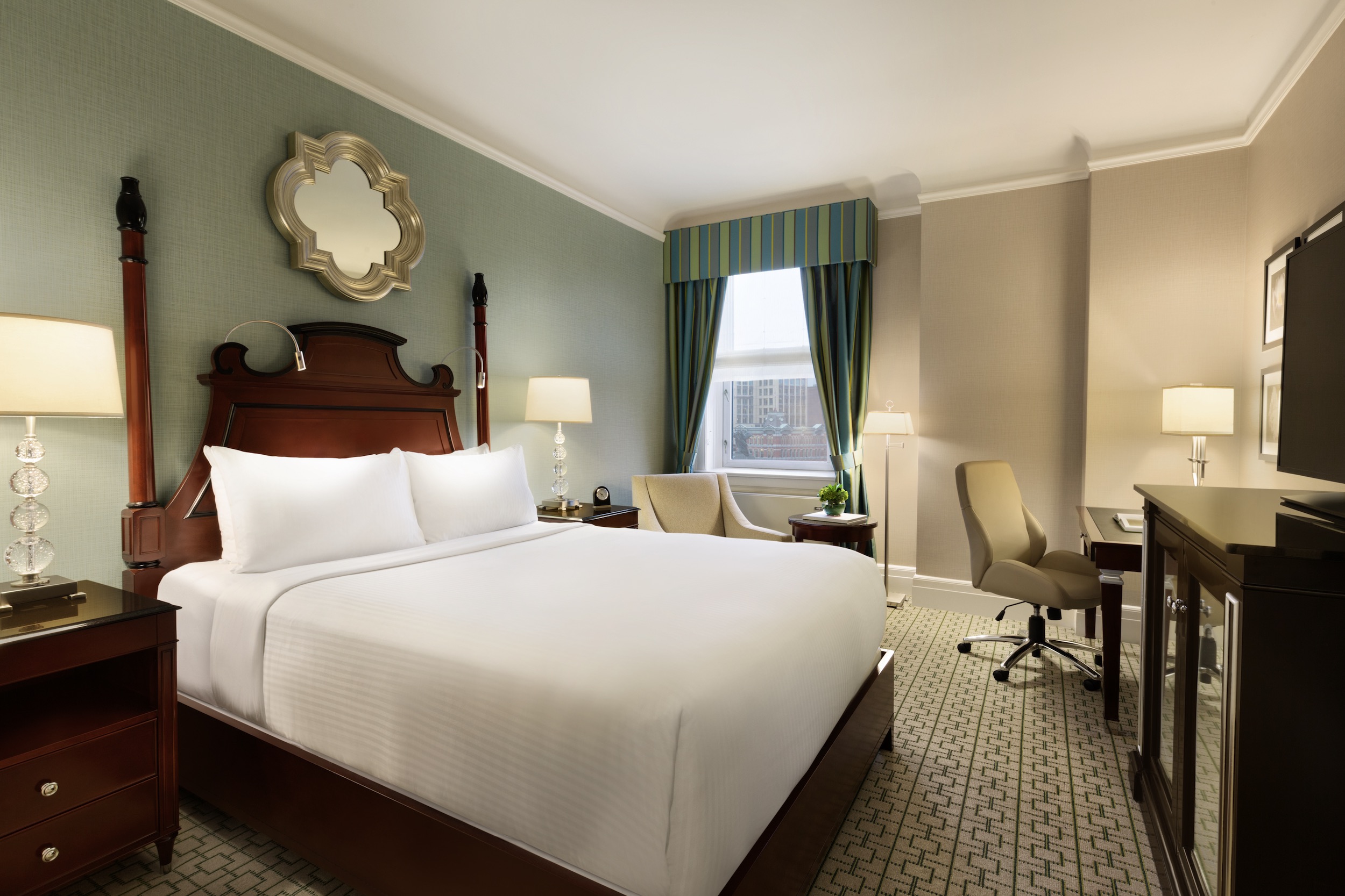 bed with small seating area