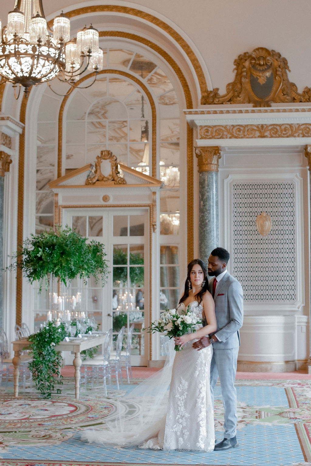 bride and groom in large foyer