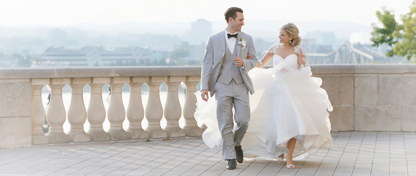 bride and groom on balcony